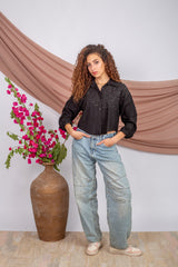 Black cropped chemise with relaxed fit and modest cut