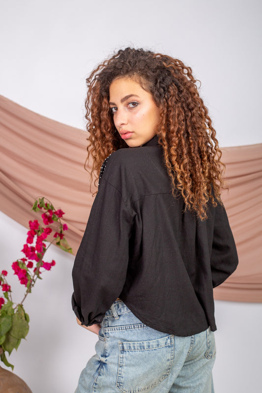 Black cropped chemise with relaxed fit and modest