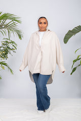 Woman wearing a lined chemise with long sleeves and modest fit