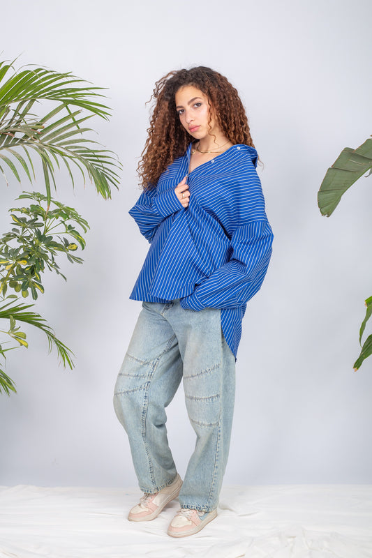 Woman wearing a lined chemise with long sleeves and modest fit