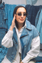 Woman wearing light-wash denim