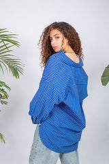 Woman wearing a lined chemise with long sleeves and modest 